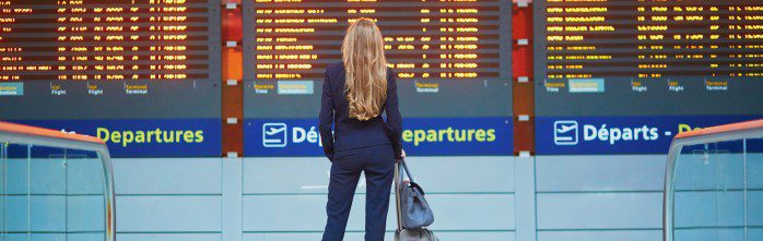Woman in International Airport 698x221