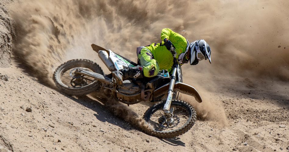 man riding motocross dirt bike
